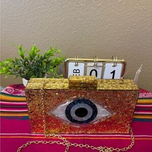 Gold Glitter Eye Clutch